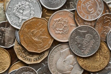 Dividend investing – pile of coins representing dividend income