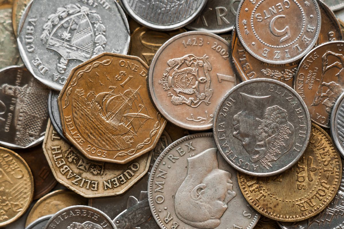 Dividend investing – pile of coins representing dividend income