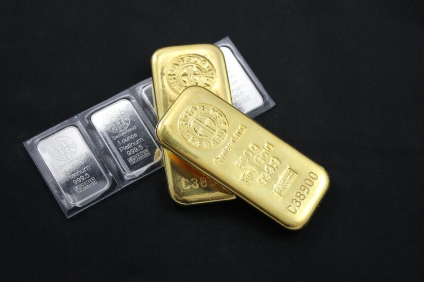 Invest in gold – close-up of gold and platinum bars