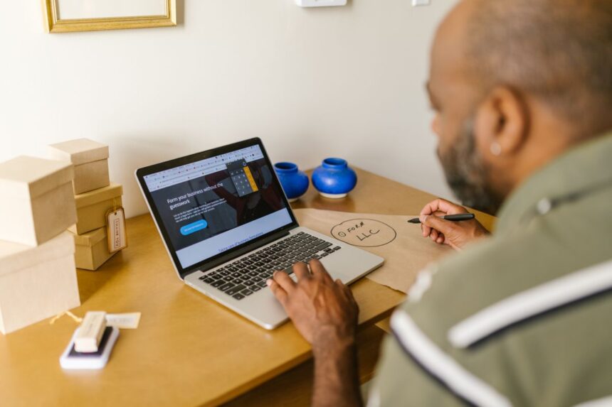 LLC for side hustle – entrepreneur planning a business on a laptop