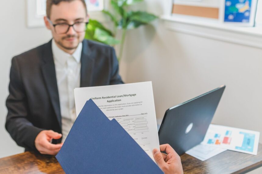 PMI – mortgage broker and client discussing a loan application