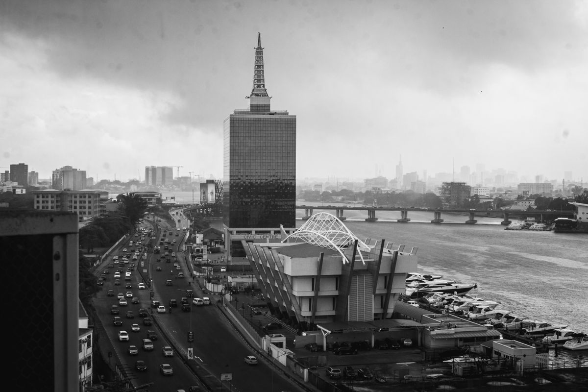 Verify car insurance in Nigeria – lagos cityscape with a busy road